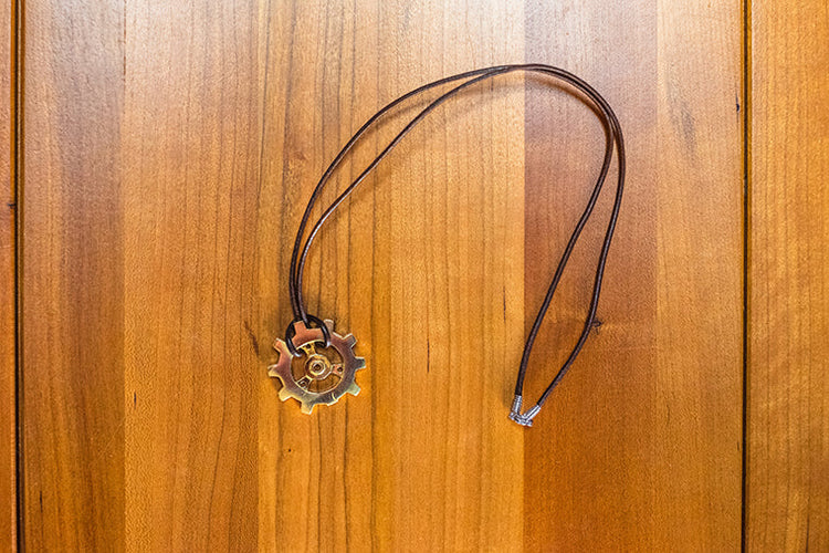 Auri's Brazen Gear Pendant